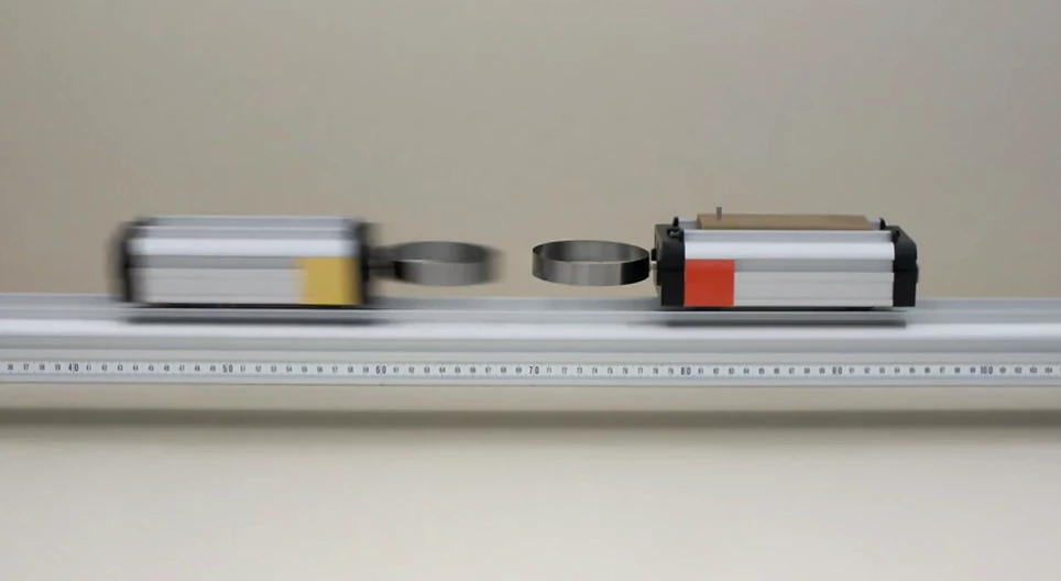 異なる質量の二台の車の弾性衝突 II