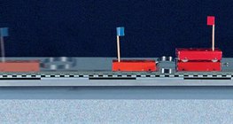 用弹簧推开两辆质量不同的车